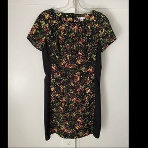 Mini fitted black dress with neon floral